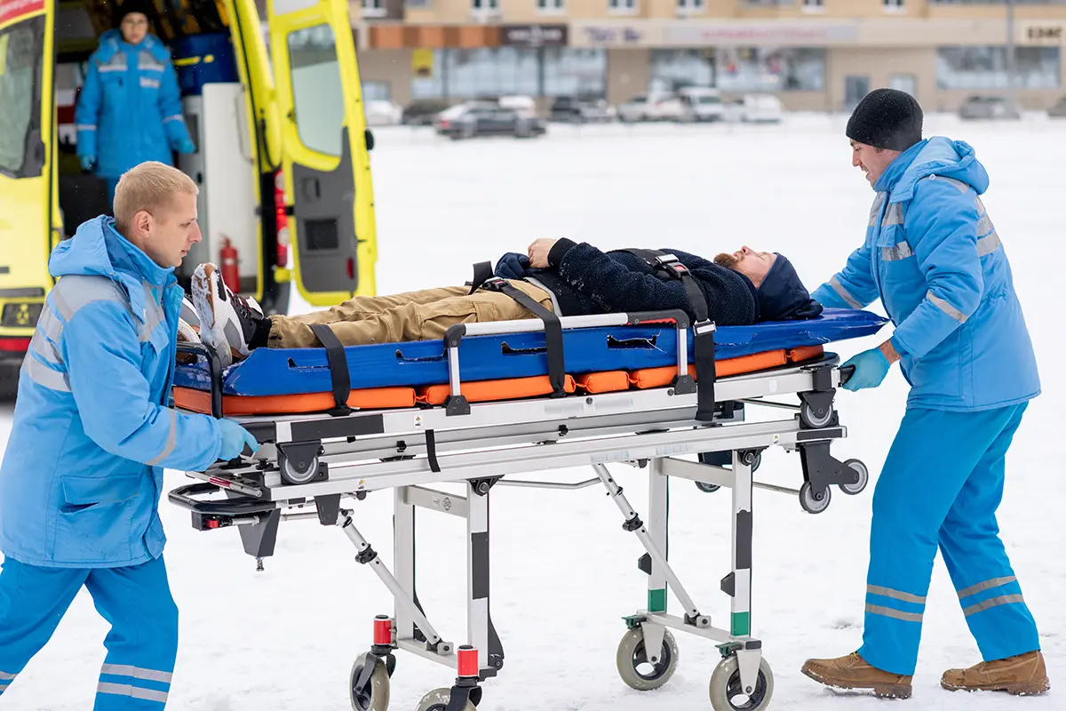 two-paramedics-pushing-sick-unconscious-man-on-str-2025-04-01-02-44-23-utc (1)
